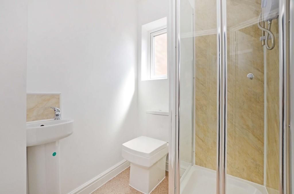 Property photo 3 of 9 A Bright, Modern Bathroom Featuring A Clear Glass ...