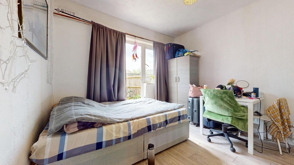 Property photo 2 of 8 A Neat And Well-Lit Bedroom With A Comfortable Sin...