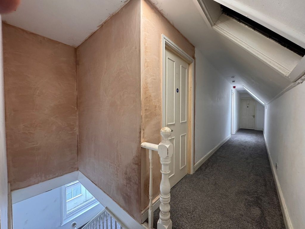 Property photo 2 of 2 Bright Hallway With Fresh Grey Carpeting...