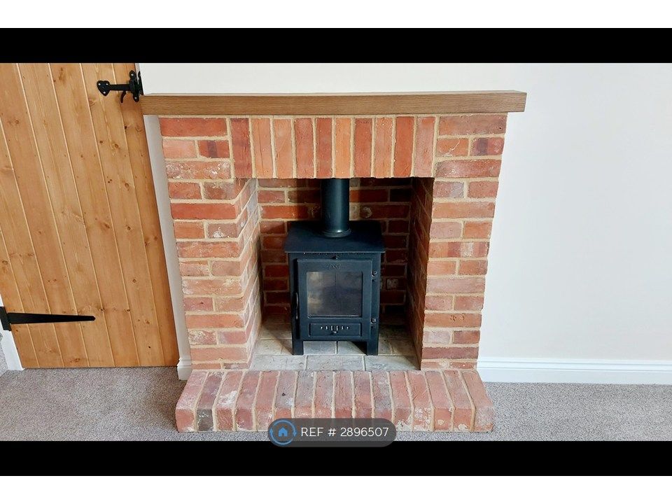 Property photo 3 of 12 Living Room Fireplace
