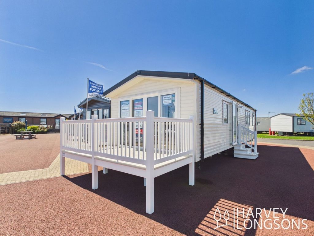 Property photo 1 of 17 Willerby Malton Holiday Home Exterior With Decking At Amble Links Holiday Park