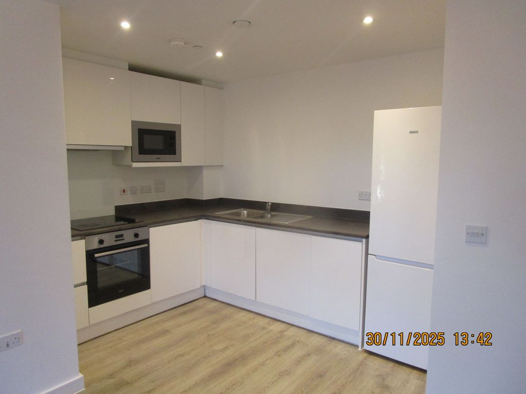 Property photo 3 of 12 Stylish Kitchen