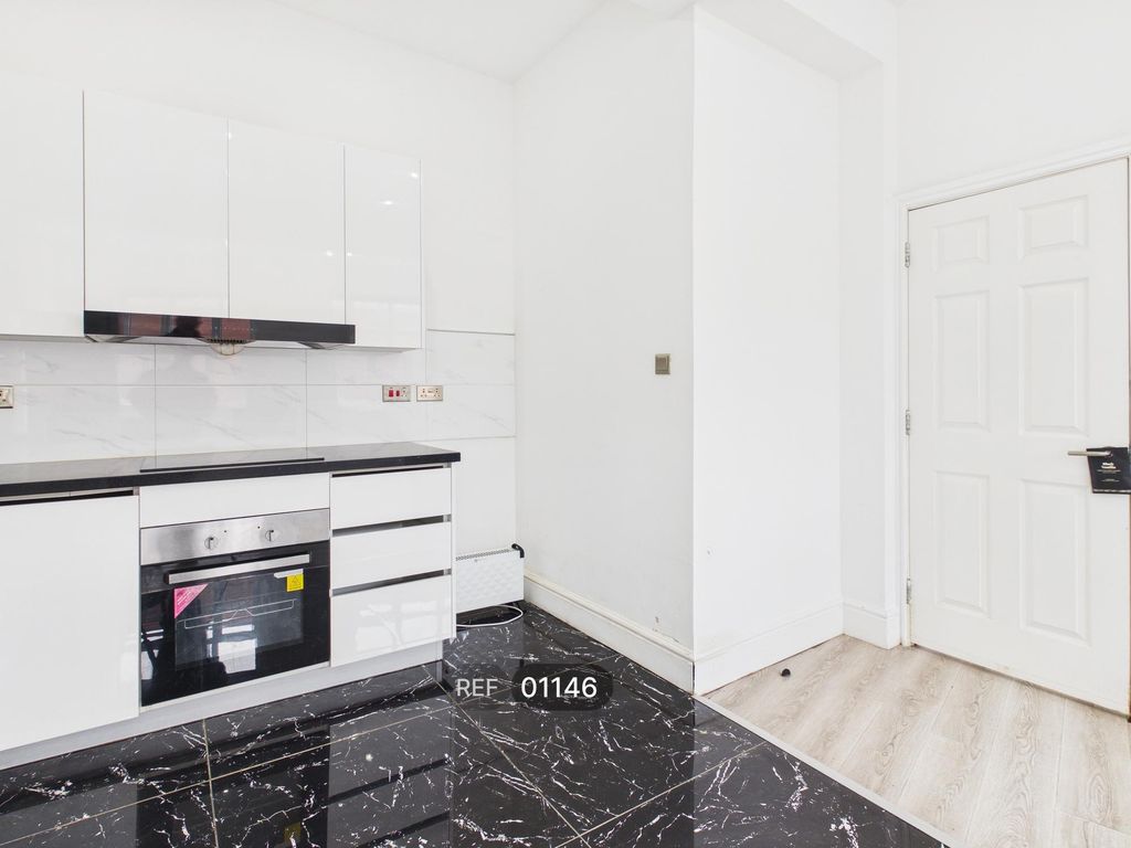 Property photo 2 of 19 Kitchen &amp; Living Area