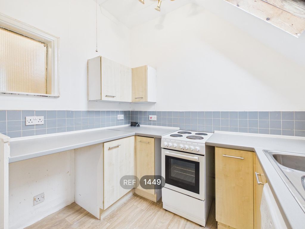 Property photo 2 of 15 Kitchen & Living Area