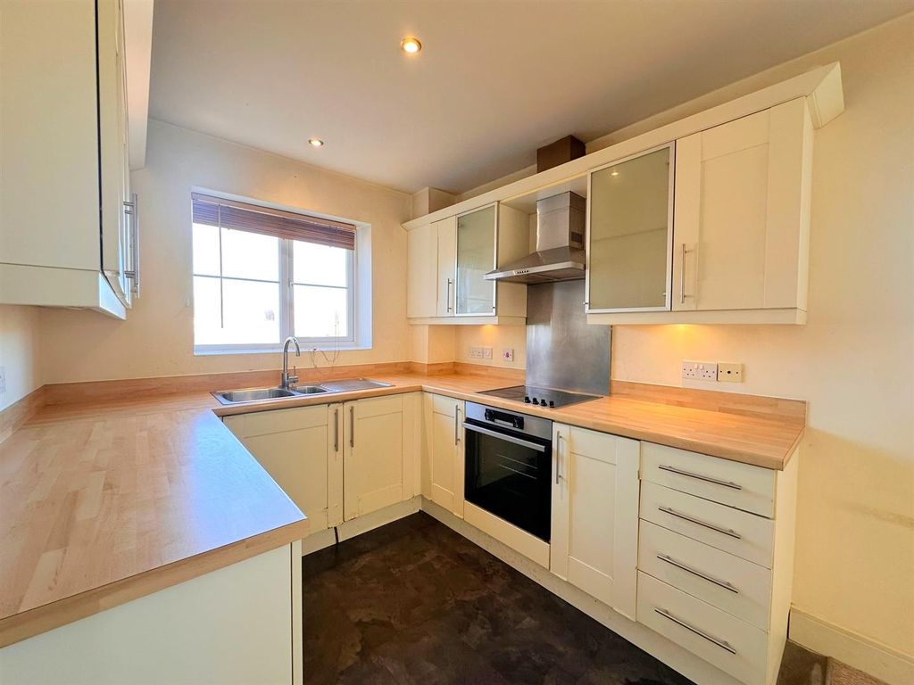 Property photo 3 of 8 Kitchen Area