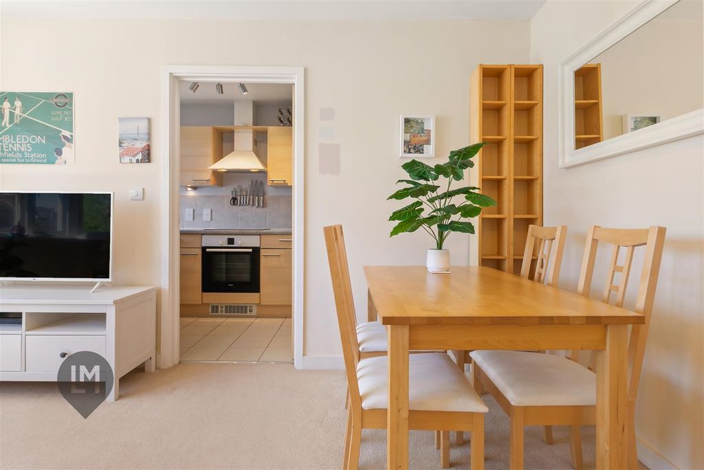 Property photo 2 of 6 Living/Dining Room