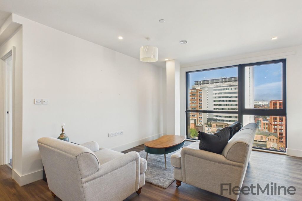 Property photo 3 of 18 Living Area