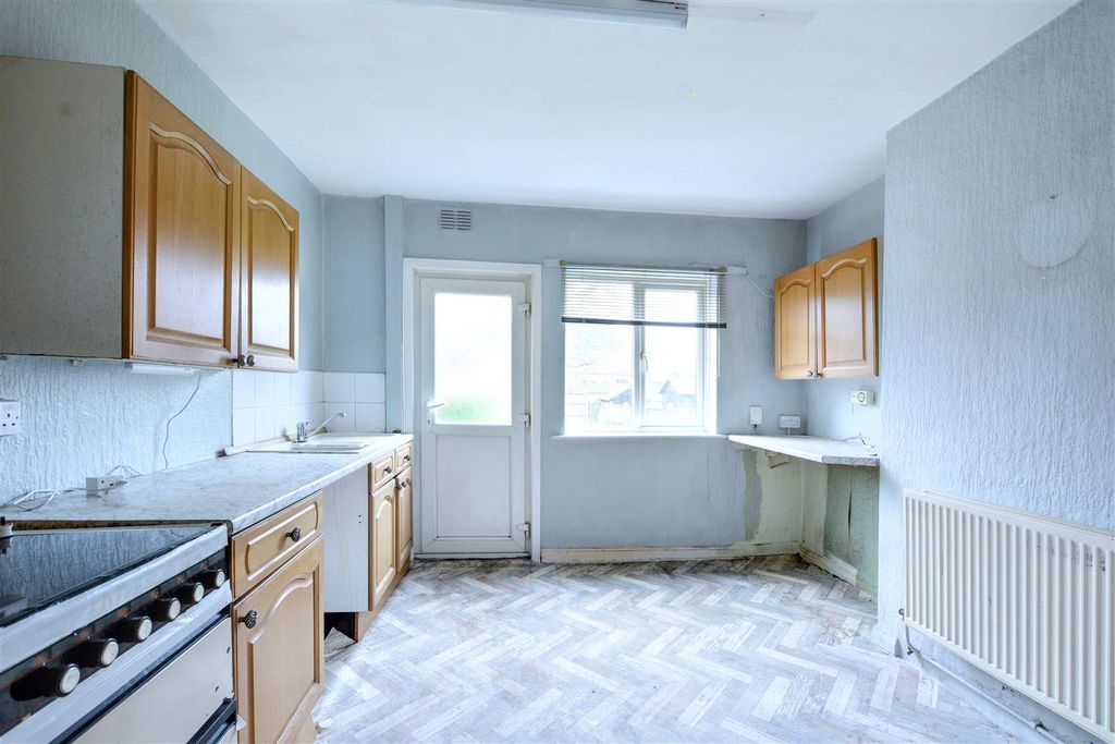 Property photo 3 of 12 Dining Kitchen