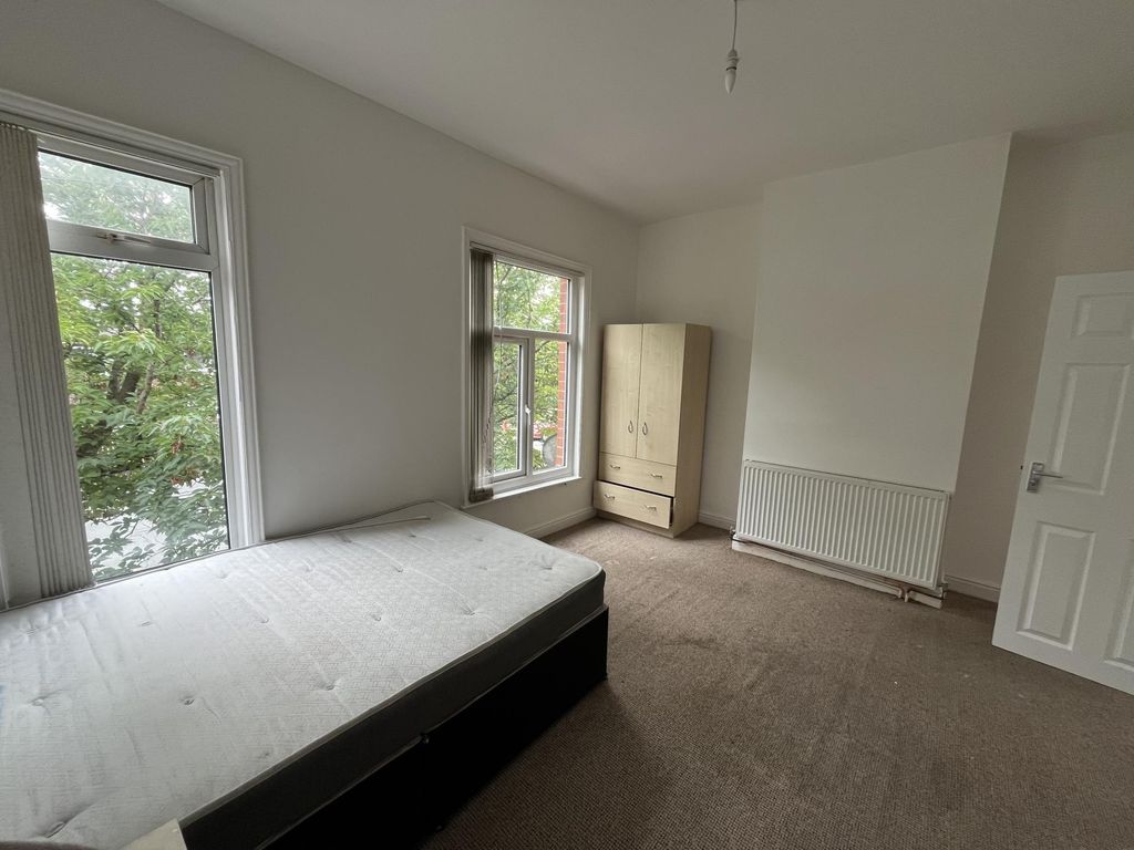 Property photo 3 of 11 Bright Double Bedroom Featuring Large Windows That...