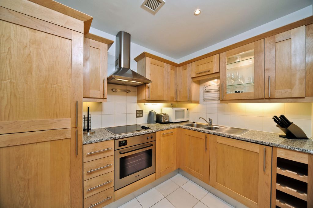 Property photo 2 of 11 Kitchen