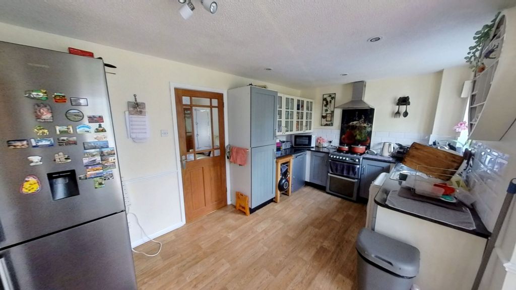 Property photo 2 of 12 Kitchen