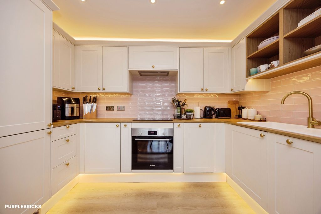 Property photo 2 of 12 Kitchen