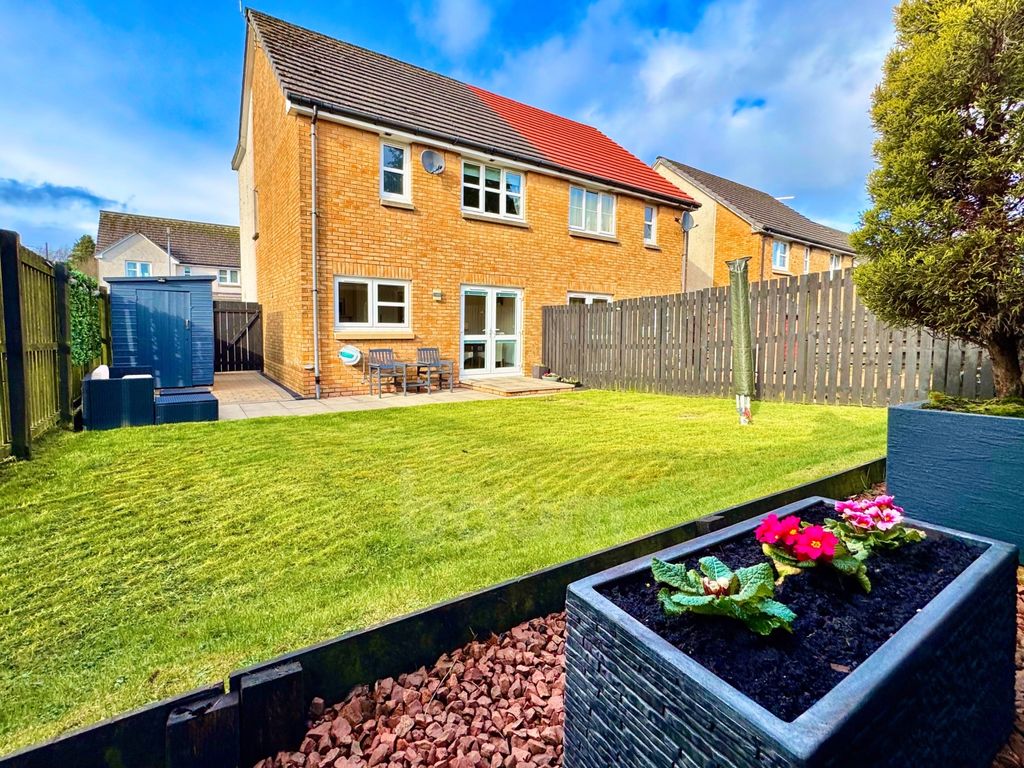 Property photo 1 of 34 Millbarr Grove, Barrmill Rear Garden Picture