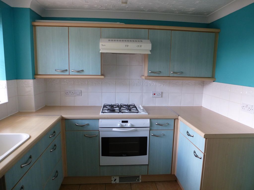 Property photo 3 of 8 Kitchen