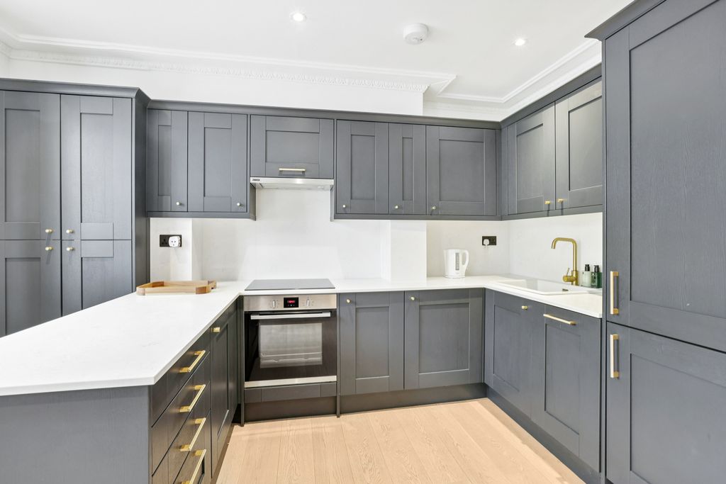 Property photo 2 of 8 Kitchen