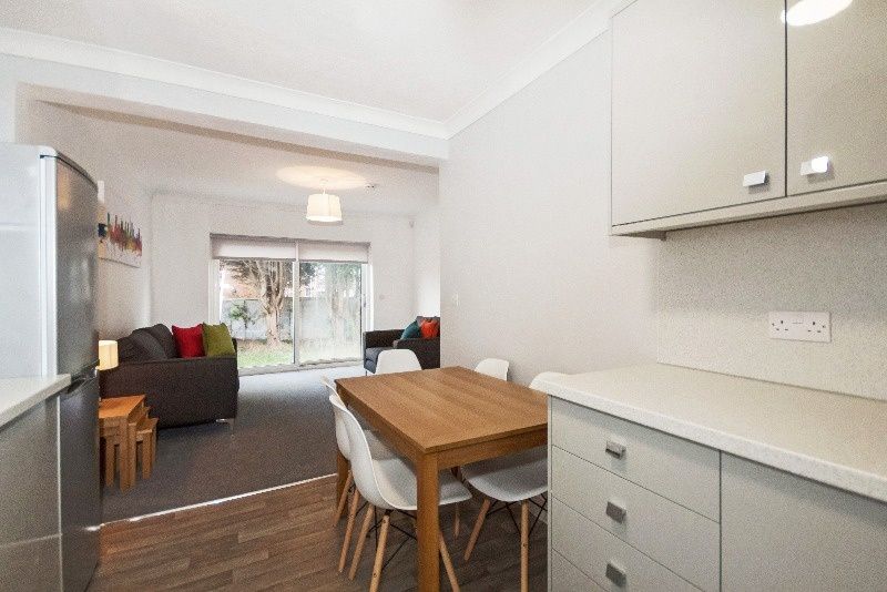 Property photo 3 of 12 A Bright And Inviting Living Room With A Modern di...