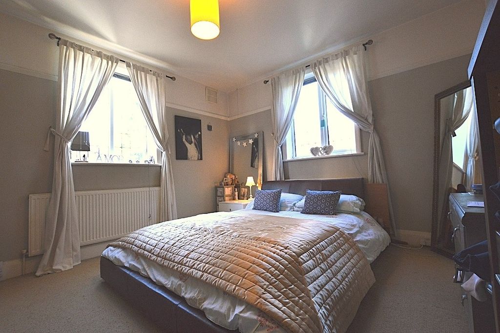 Property photo 2 of 8 A Bright And Inviting Master Bedroom Featuring A c...