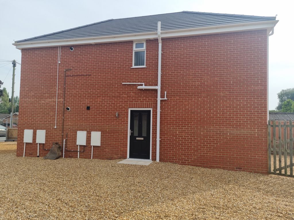 Property photo 3 of 8 Front