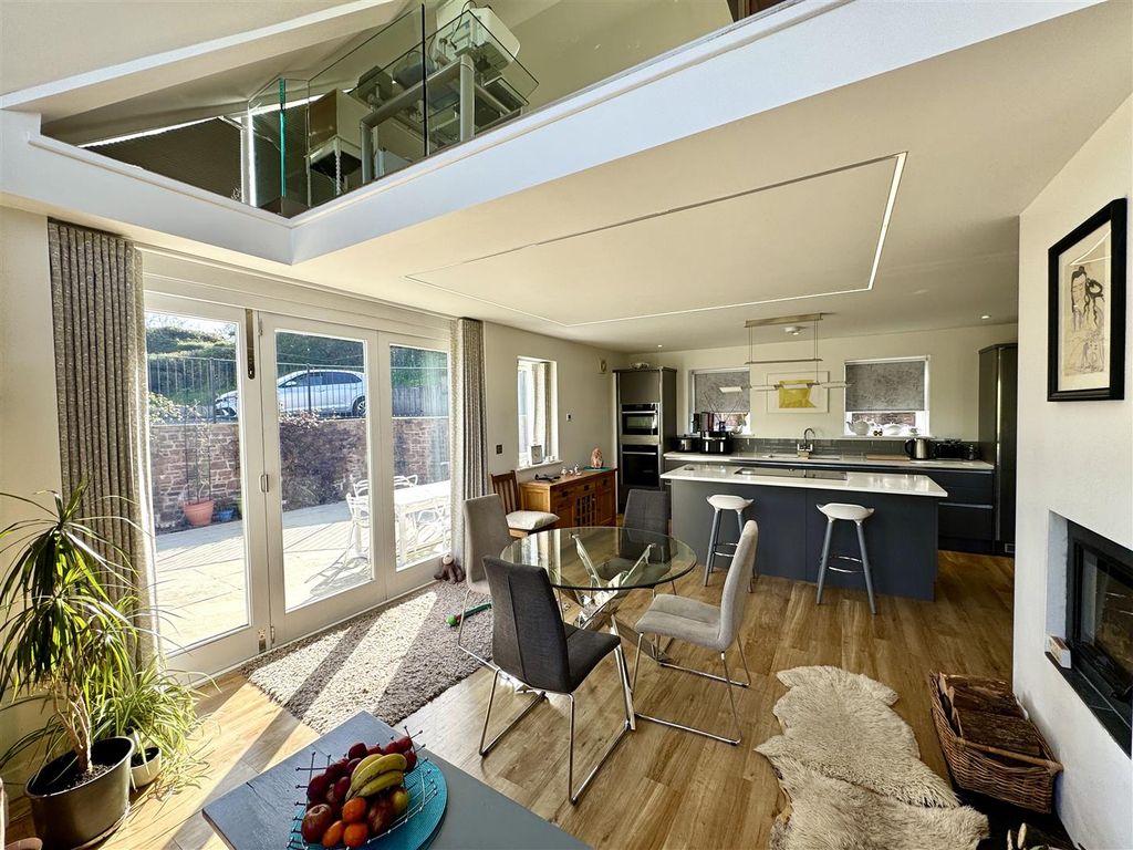 Property photo 2 of 21 Kitchen/Dining/Family Room