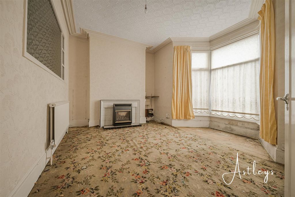 Property photo 3 of 16 Front Lounge