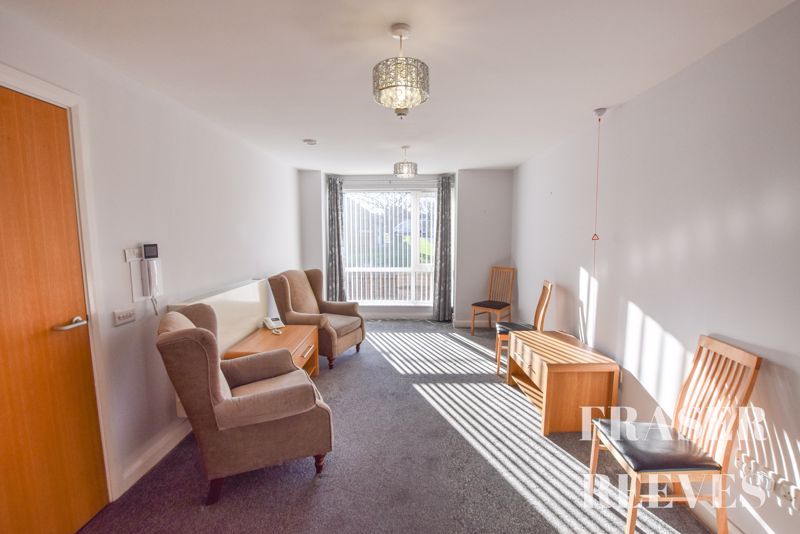 Property photo 2 of 10 Living Area