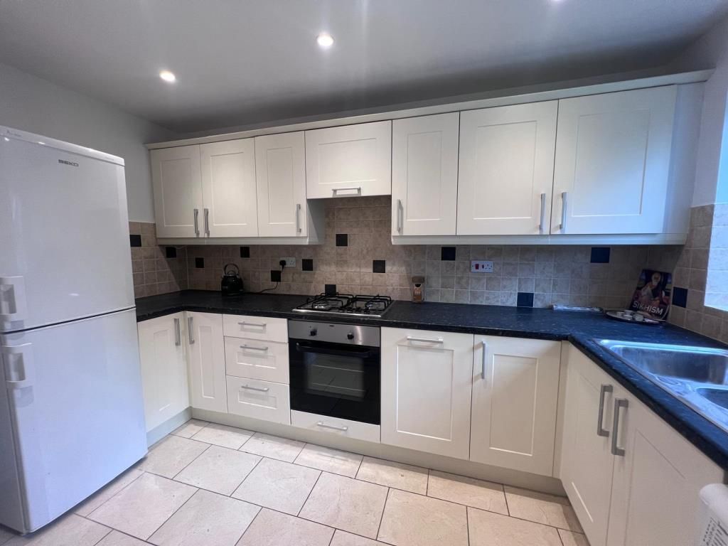 Property photo 2 of 12 Kitchen