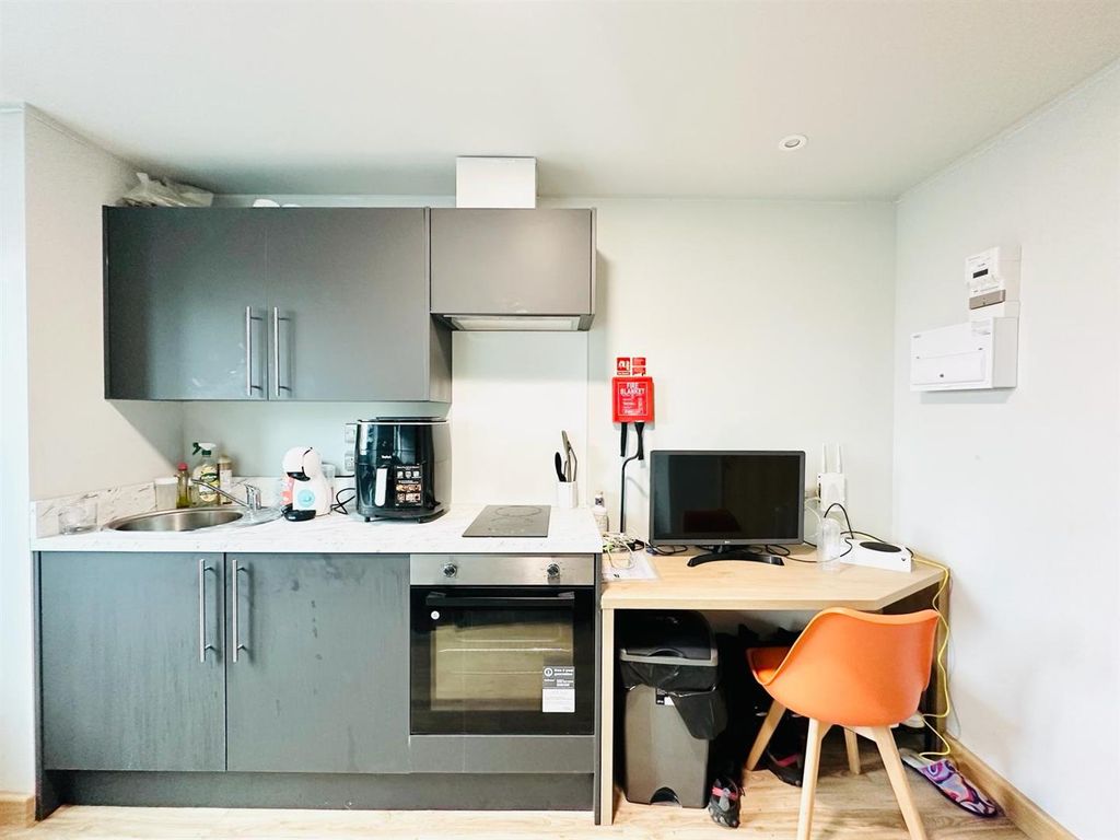 Property photo 2 of 19 Kitchen Area