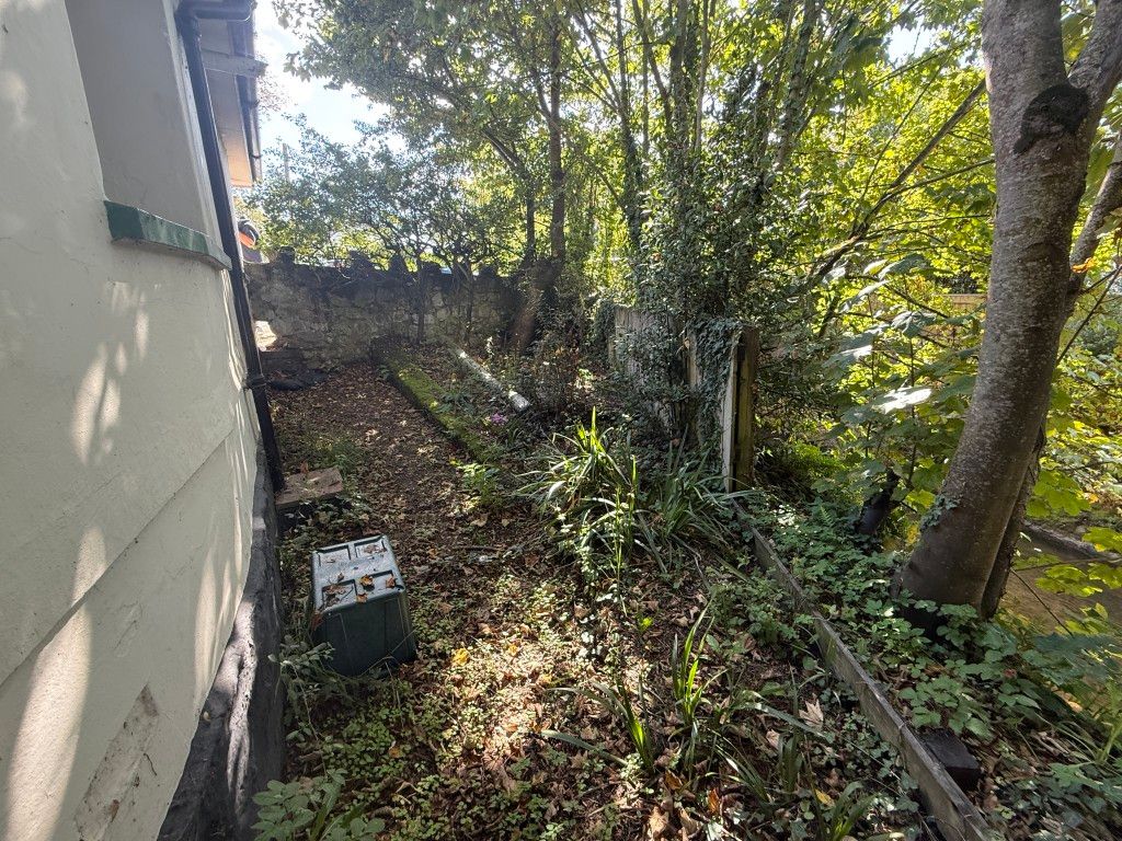 Property photo 3 of 11 Side Garden