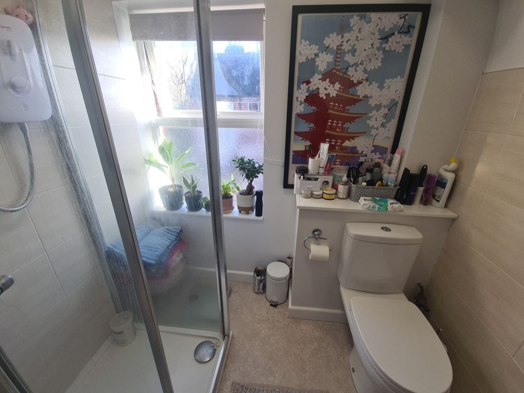 Property photo 2 of 6 Bright, Modern Bathroom With A Walk-In Shower, Con...