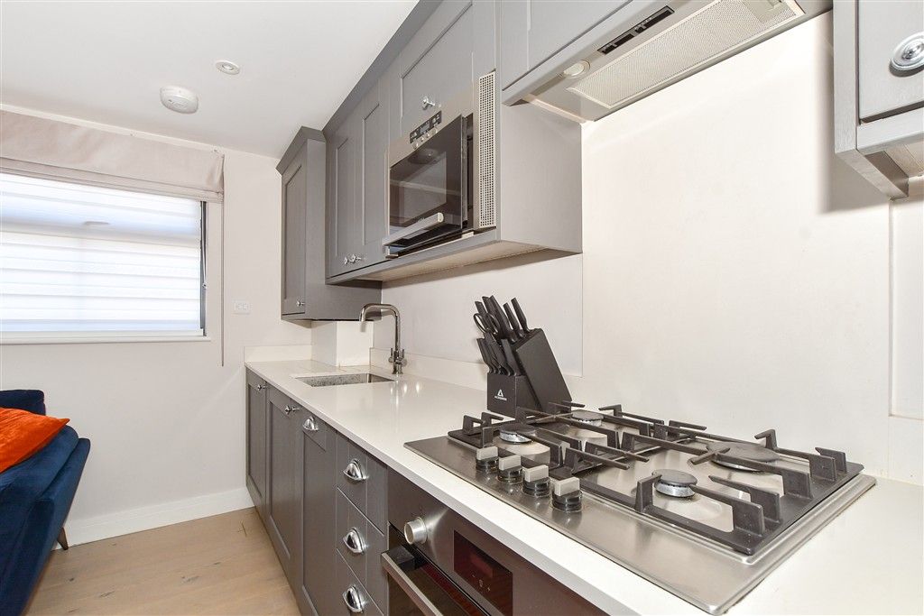 Property photo 3 of 9 Kitchen Area