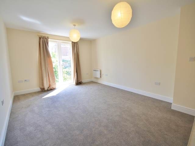 Property photo 3 of 8 Living Room