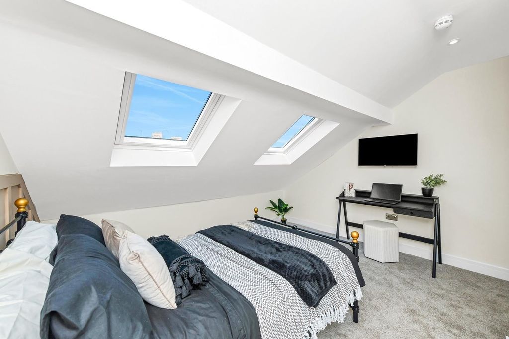 Property photo 3 of 18 A Stylish Double Bedroom Featuring Skylights That ...