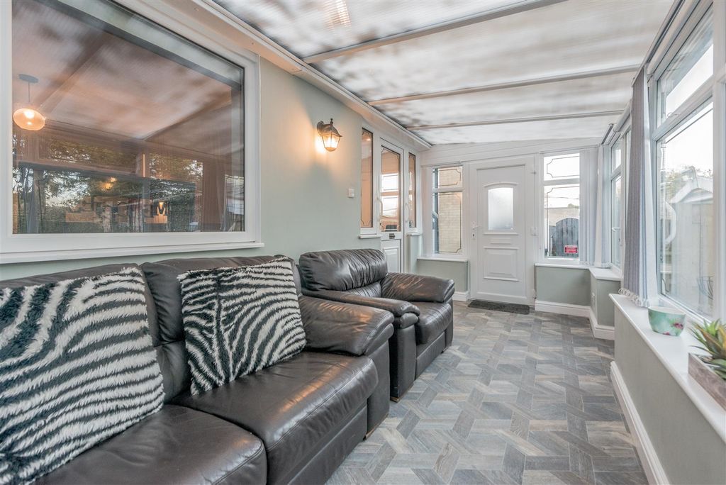 Property photo 3 of 19 Conservatory: