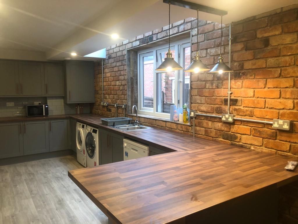 Property photo 3 of 7 Modern Kitchen With Warm Wood-Effect Countertops, ...