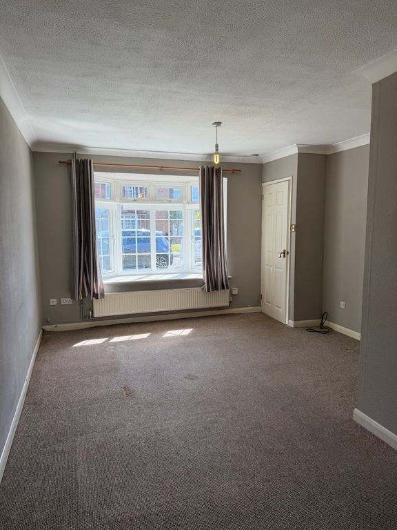 Property photo 3 of 12 Living Room 2