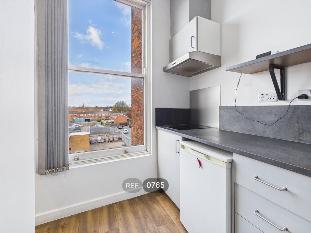 Property photo 3 of 17 Kitchen/Living Area