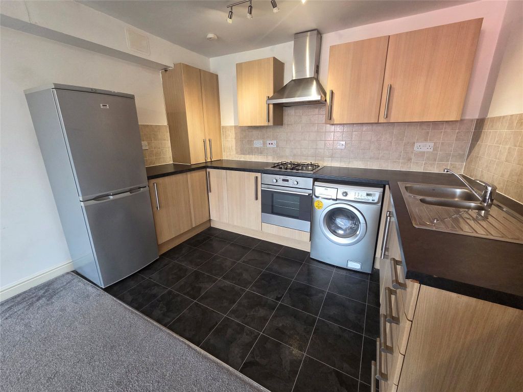 Property photo 2 of 11 Kitchen