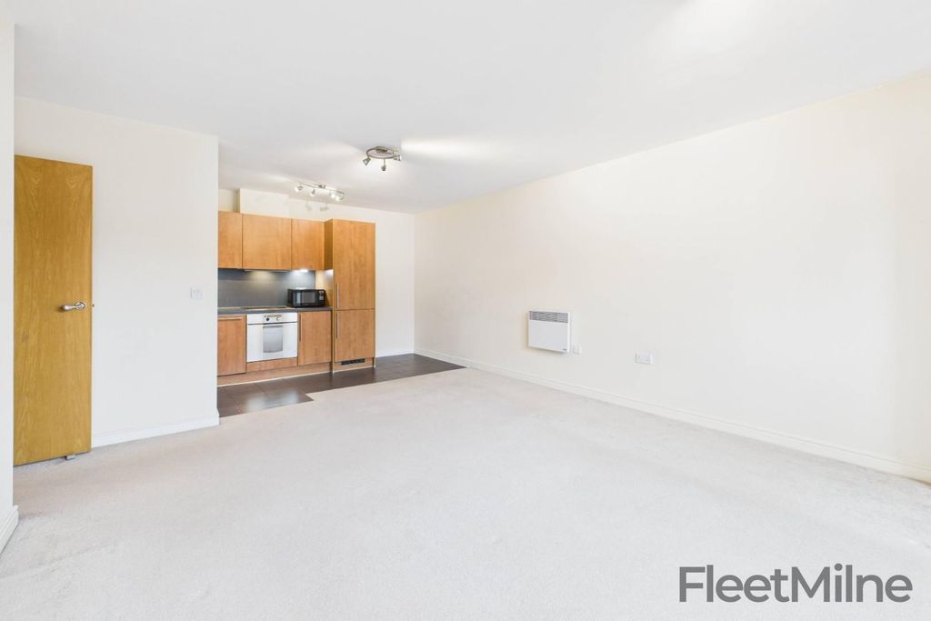 Property photo 3 of 12 Living Area