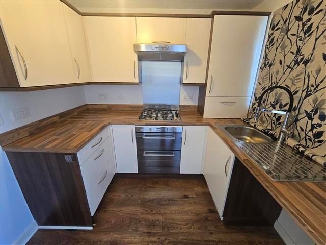 Property photo 3 of 7 Kitchen