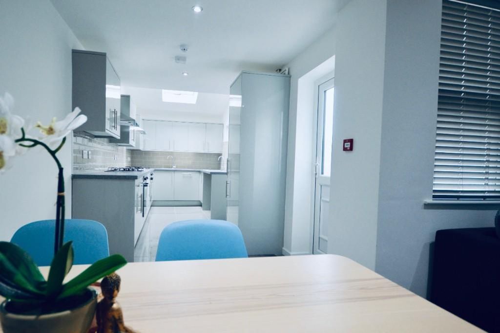 Property photo 2 of 15 A Modern And Spacious Kitchen With Ample Natural l...