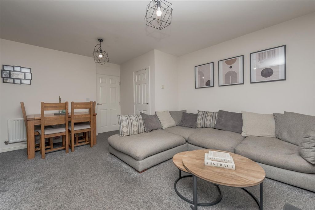 Property photo 2 of 17 Living / Dining Room: