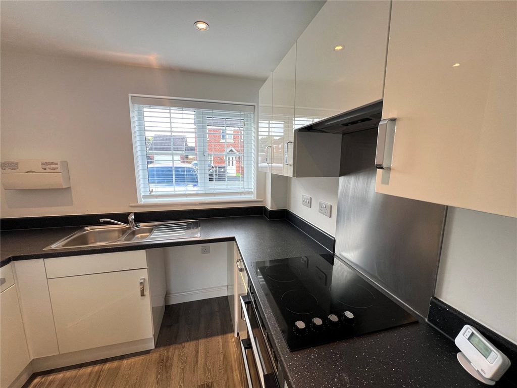 Property photo 2 of 9 Kitchen