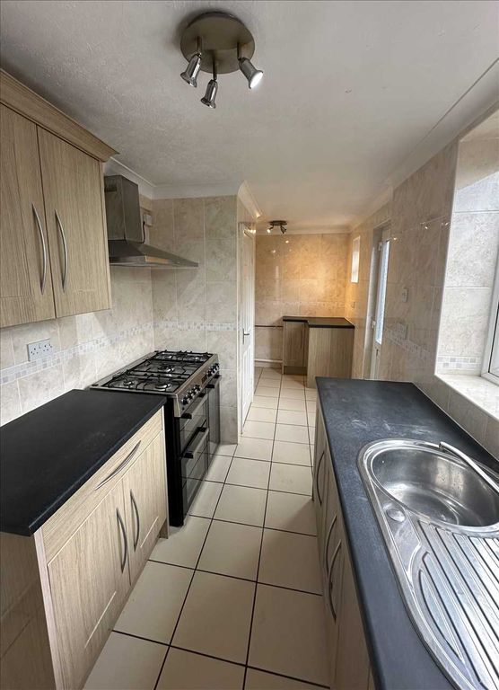 Property photo 3 of 18 Generous Breakfast Kitchen: