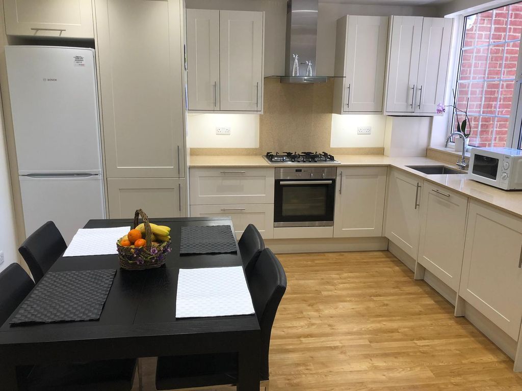 Property photo 1 of 20 Kitchen Area