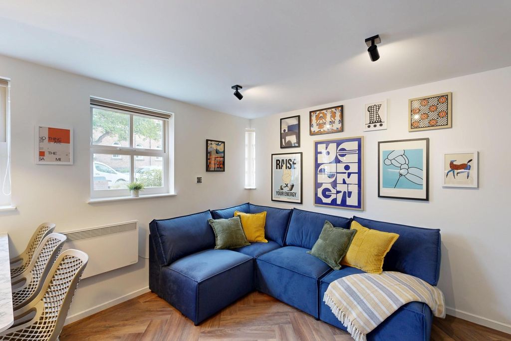 Property photo 1 of 15 Bright, Modern Living Room With A Comfortable Blue...