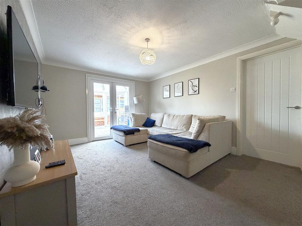 Property photo 2 of 18 Generous Living Room 086
