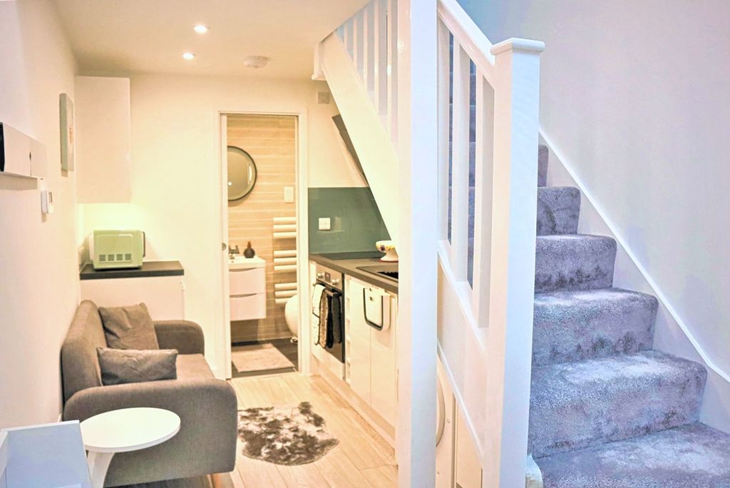 Property photo 2 of 10 Living Area