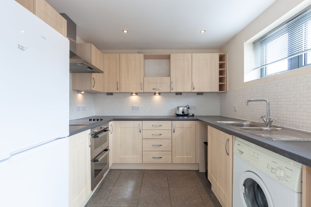 Property photo 2 of 13 Kitchen