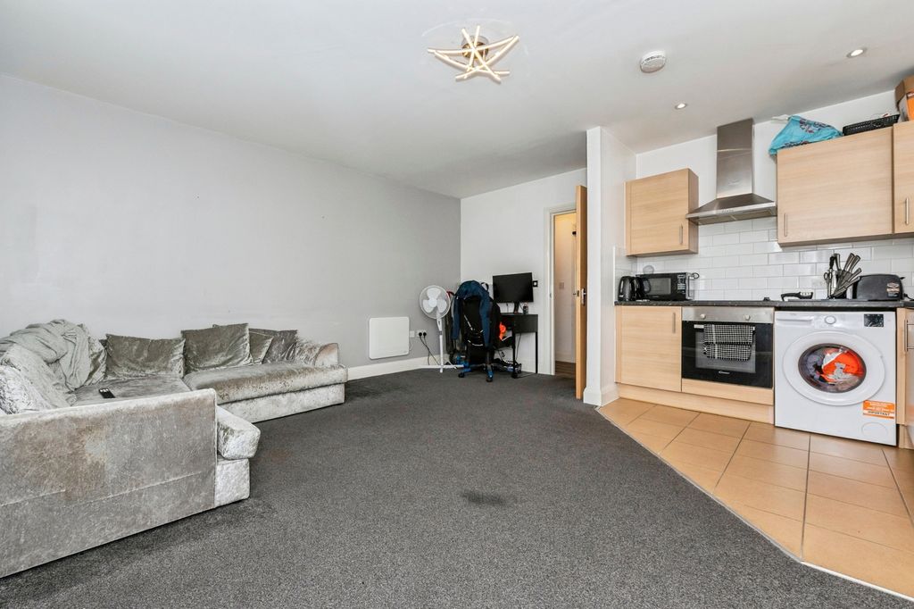 Property photo 2 of 10 Living