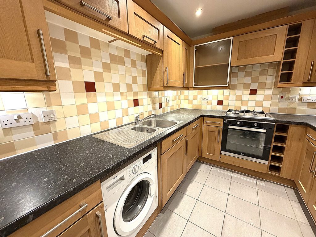 Property photo 3 of 7 Kitchen